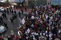 Portland-22/08: Protesters gather near a police line.