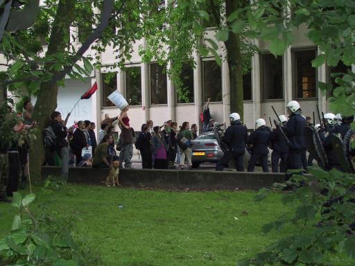 angry standoff between demonstrators and police