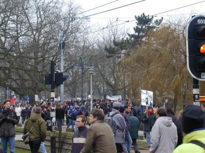 demonstrators marching away from the leidseplein