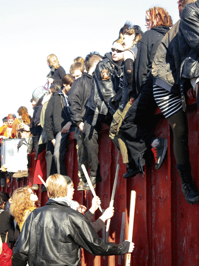 The walls surrounding the embassy get hammered