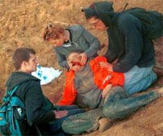 Rachel Corrie lies on the ground fatally injured by the Israeli bulldozer driver