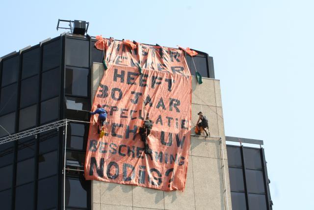 Climbers fixing the first banner