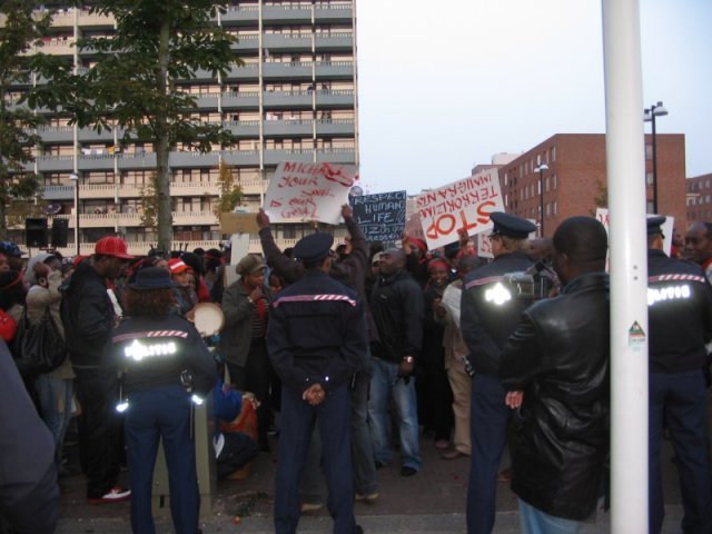 The line of police blocking the way and not making a statement