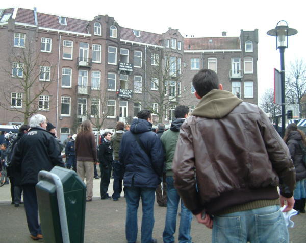 neighbours watch curiously and support squatters