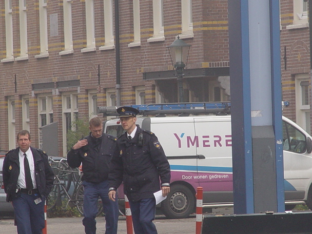 The neighbourhood cop responsible for the arrest, and his big hat