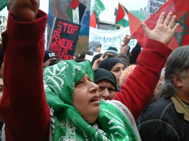 Woman at front of crowd